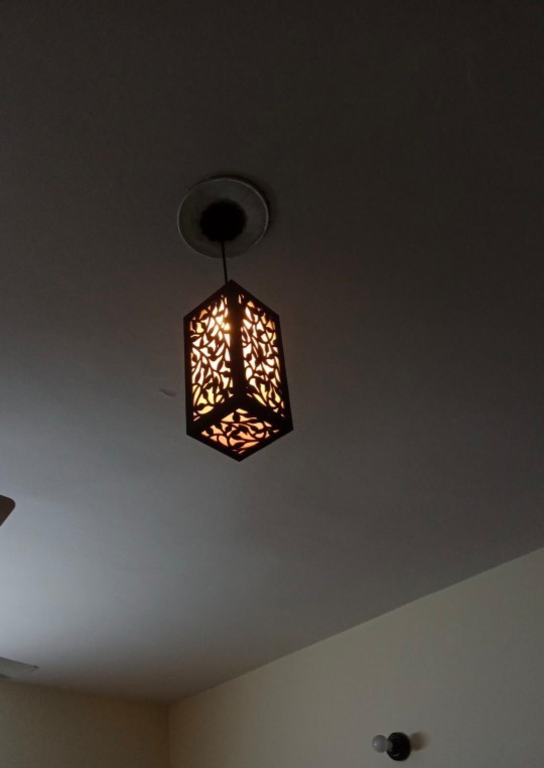 Elegant Leaf Pattern Hanging Lantern Warm Ambient Light
